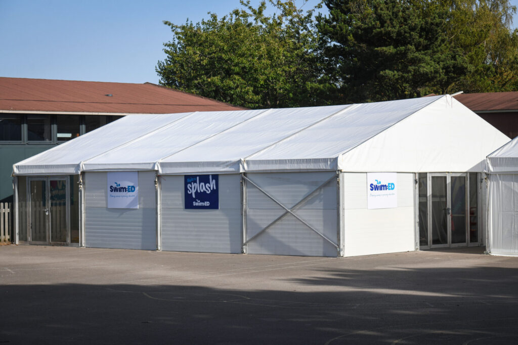 outside view of a pop up pool marquee tent