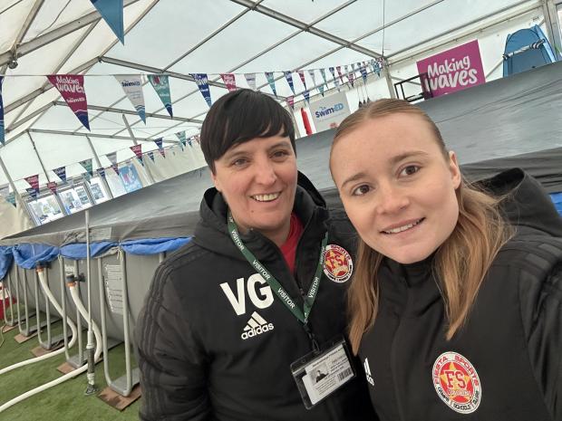 Vicky Galager and Georgia Coulson standing next to the pop up pool